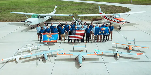 University of Kansas aerospace engineering degree students designing aerospace models in engineering lab