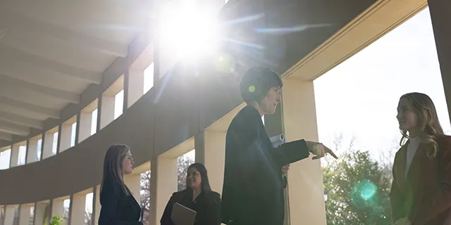 Master of American Legal Studies students debating U.S. constitutional law in a university of Kansas legal studies court room