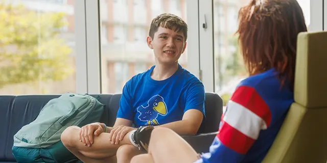 Students discussing American culture, history, and society at the University of Kansas