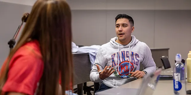 Master of applied behavior science students studying applied behavioral science at the University of Kansas
