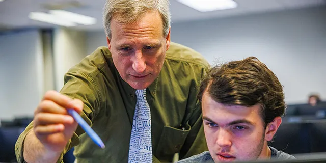 University of Kansas students learning to code in applied computing lab