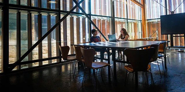 KU Masters of Architecture students working together in study hall