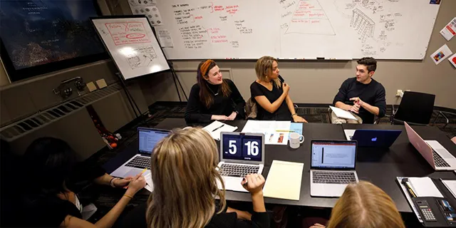 Doctor of behavioral psychology students at KU conducting behavioral experiments in a psychology research lab