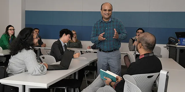 Doctor of biostatistics students at KU in a small lecture class