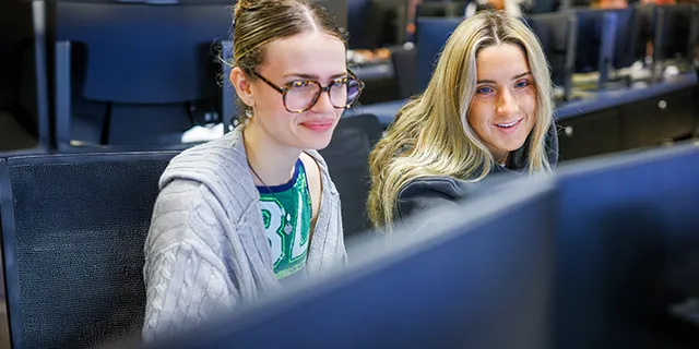 University of Kansas students discussing a project in computer engineering lab