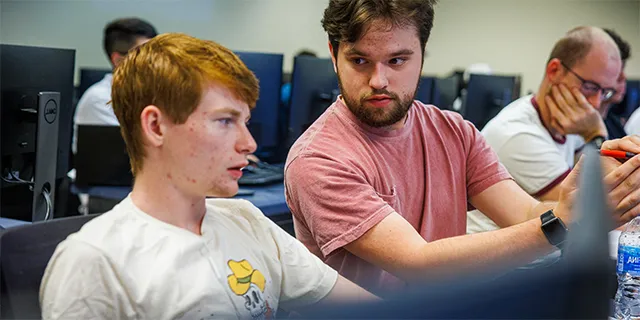 University of Kansas students coding in computer science lab