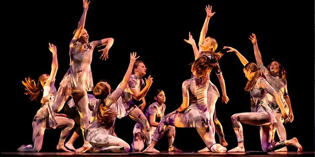 Dance degree students in the middle of a performance