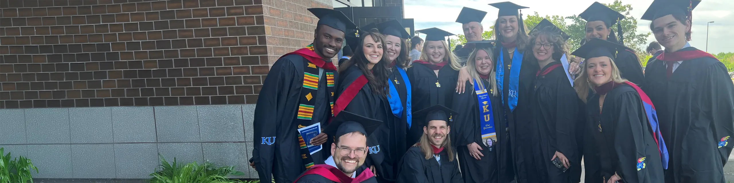Mater of digital and integrated marketing and communications graduates posing for a photo