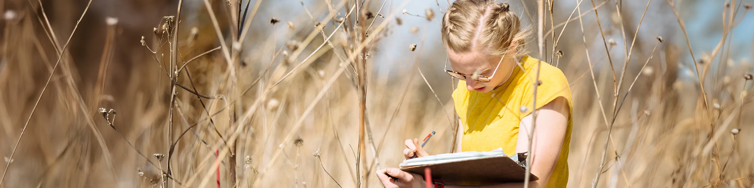 Masters of ecology and evolutionary biology student conducting ecological fieldwork