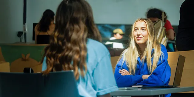 Economic degree students hanging out on KU's campus