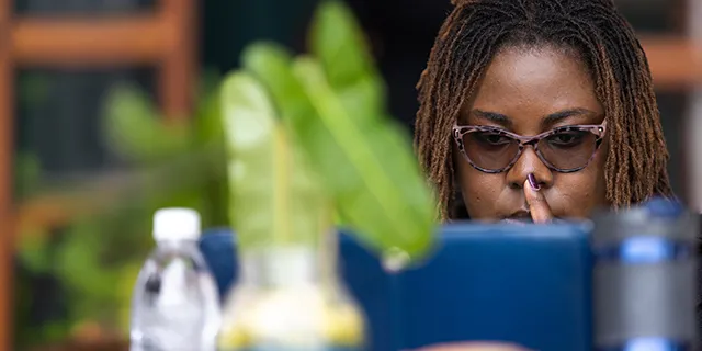 Master of education and social policy student analyzing education policy data