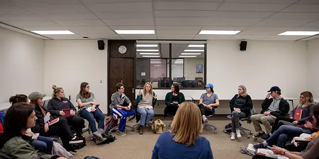 Doctorate of educational psychology and research students at KU analyzing brain imaging data in an educational psychology research lab