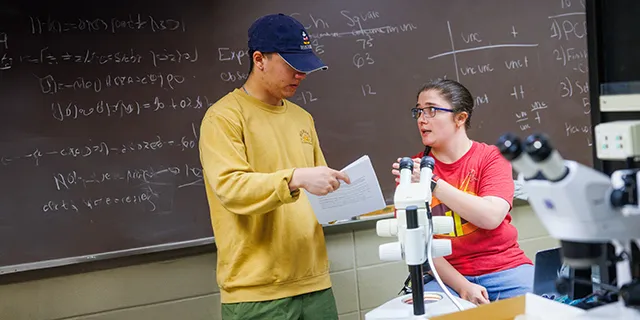 University of Kansas students analyzing health data in information management lab