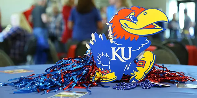 The KU Jayhawk logo at a health and society major event