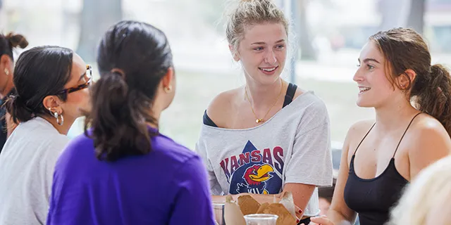 KU liberal arts and science degree students at lunch together