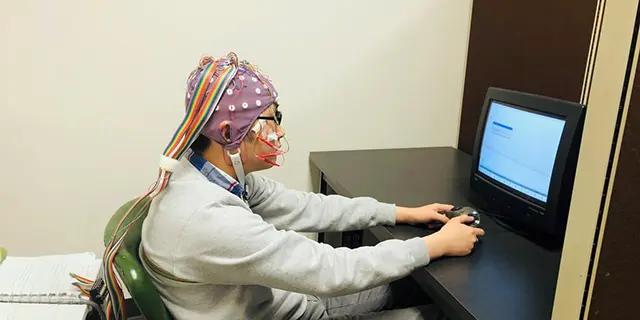 University of Kansas Doctor of linguisitics students analyzing language structures in a linguistics lab