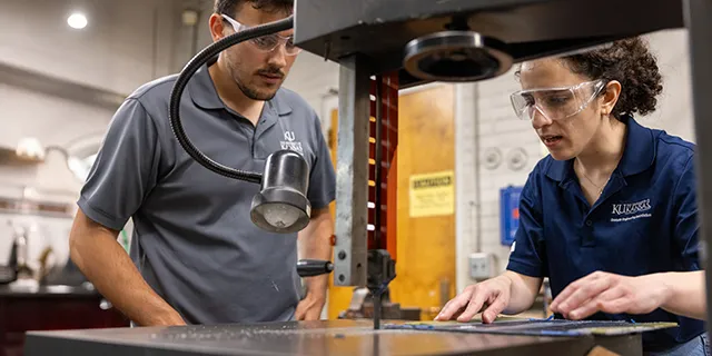 Doctor of mechanical engineering students at KU in a mechanical engineering research lab