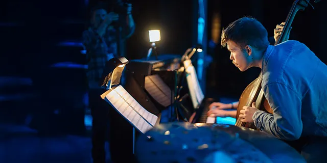 Doctorate of music education student at KU rehearsing