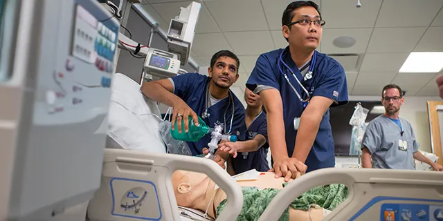 University of Kansas nursing degree students practicing in nursing clinical simulation lab