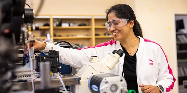 Master of pharmaceutical chemistry student at KU conducting drug synthesis in a pharmaceutical chemistry lab