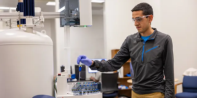 Master in pharmacology and toxicology student at KU conducting toxicity assays in a pharmacology and toxicology lab