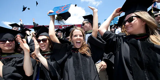 University of Kansas sport management degree students celebrating graduation