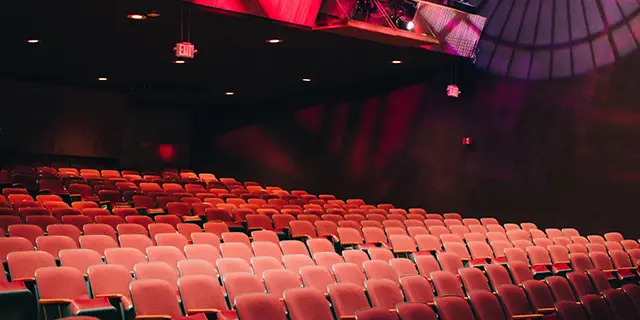An empty performance hall used by the PhD in Theatre and Performance Studies.